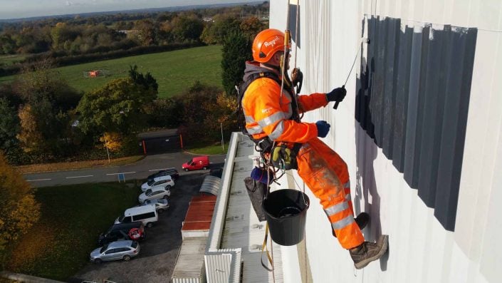 Rappel IRATA Industrial Rope Access Abseiling and MEWP - Signage Removal and Cladding Painting Project