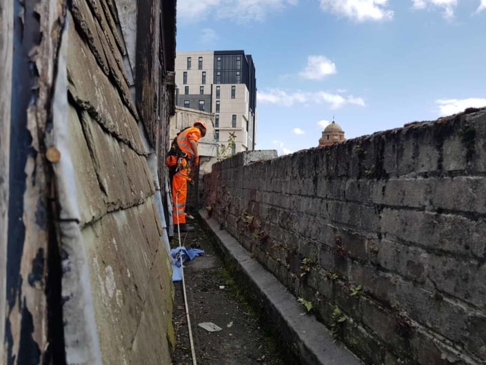 Sika Gutter Waterproofing and Lining Works, Liverpool. High Level Building Maintenance Services & Rope Access Contractors.