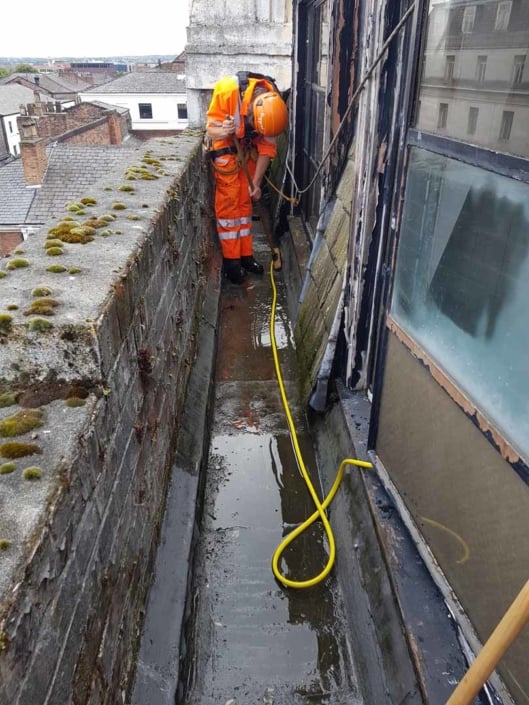 Sika Gutter Waterproofing and Lining Works, Liverpool. High Level Building Maintenance Services & Rope Access Contractors.