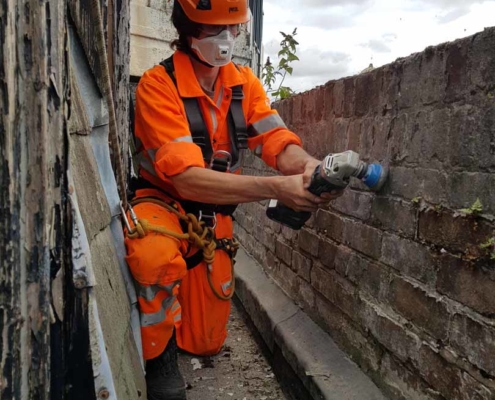 Sika Gutter Waterproofing and Lining Works, Liverpool. High Level Building Maintenance Services & Rope Access Contractors.