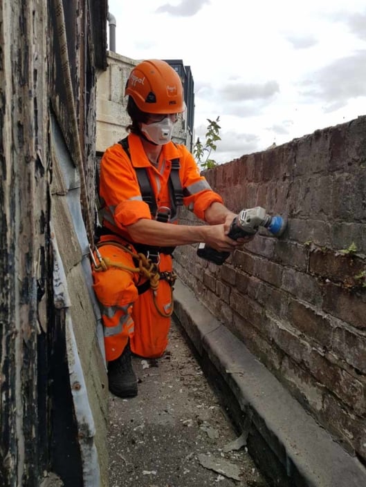 Sika Gutter Waterproofing and Lining Works, Liverpool. High Level Building Maintenance Services & Rope Access Contractors.