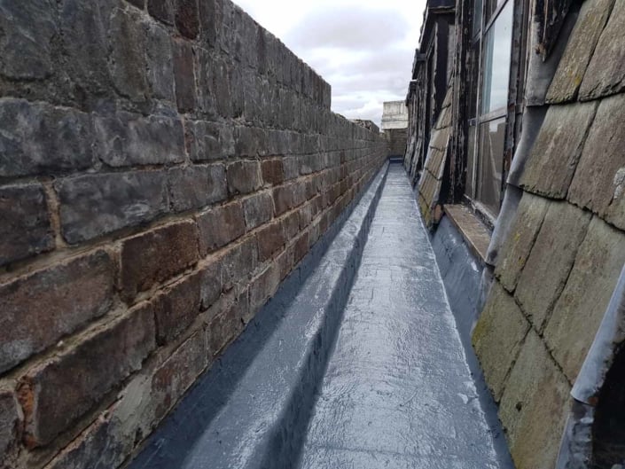 Sika Gutter Waterproofing and Lining Works, Liverpool. High Level Building Maintenance Services & Rope Access Contractors.