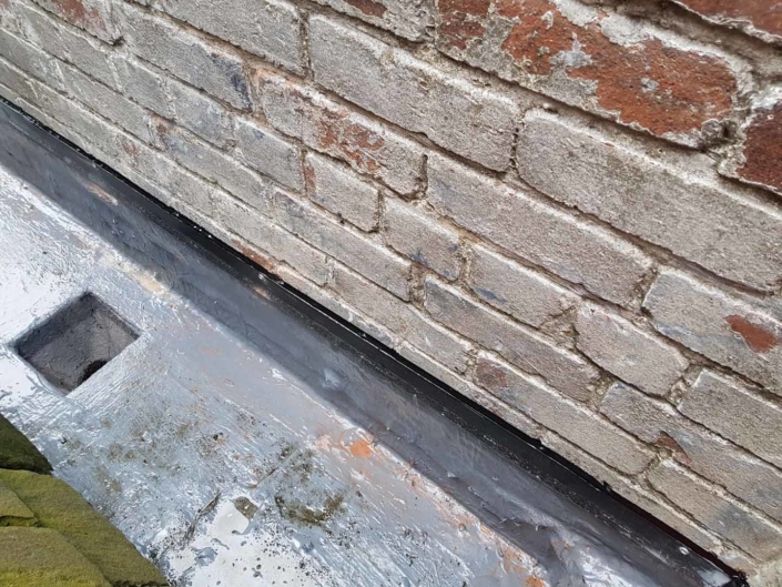 Sika Gutter Waterproofing and Lining Works, Liverpool. High Level Building Maintenance Services & Rope Access Contractors.