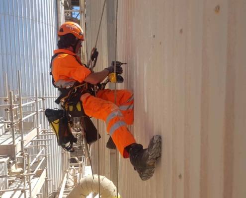 Rope Access Contractors Installing Cladding Fixings using IRATA trained technicians