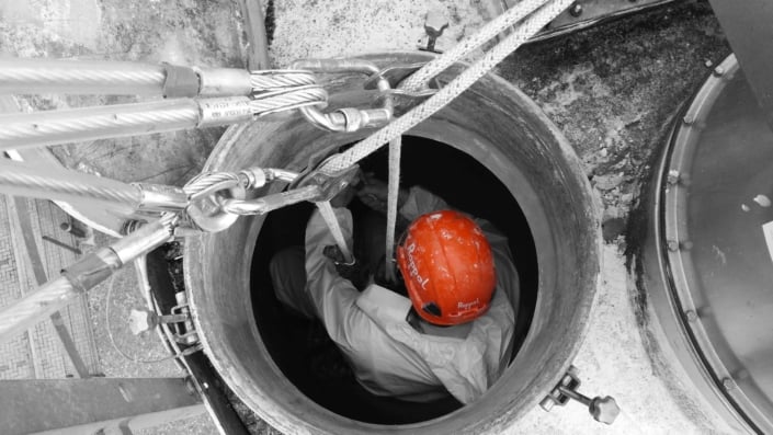 Rappel rope access and confined space trained team undertaking silo cleaning works