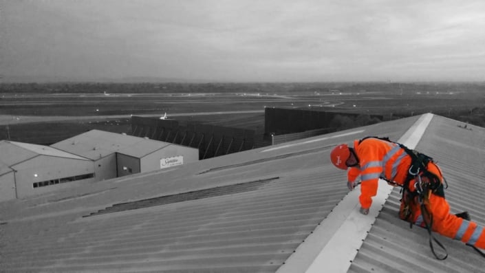 Rappel rope access system used to undertake commercial roof maintenance works