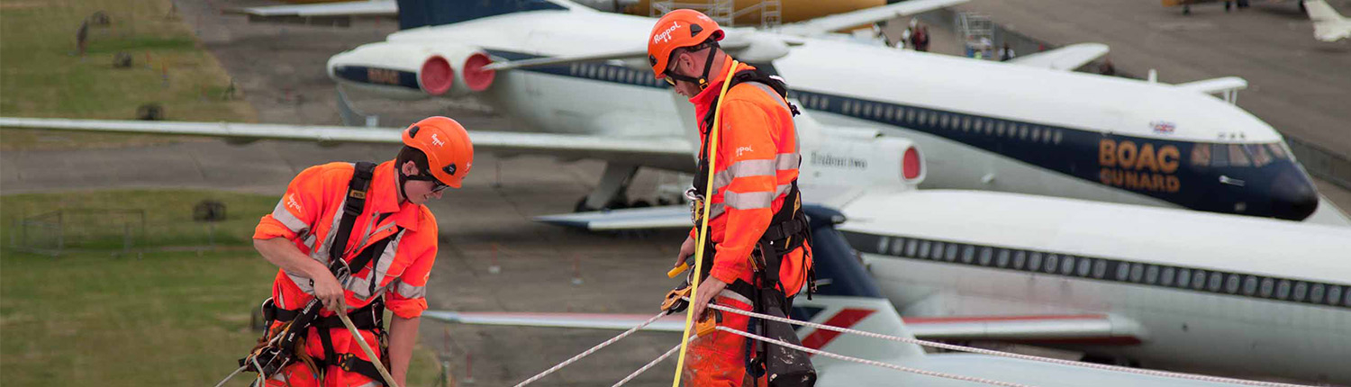 Rope Access team cleaning a building roof