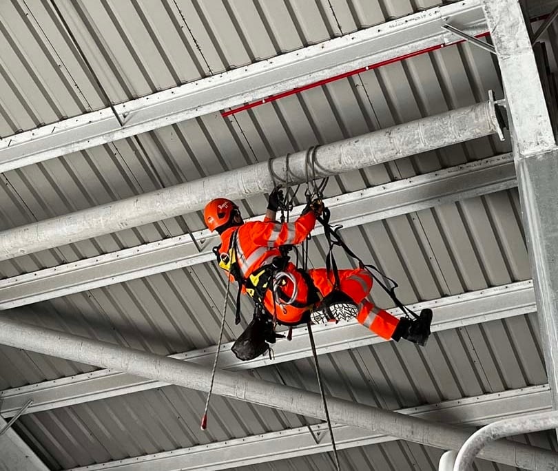 Our Rope Access team is installing an aspirating pipe fire detection system