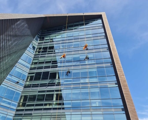Building façade inspection identifying defects and maintenance requirements